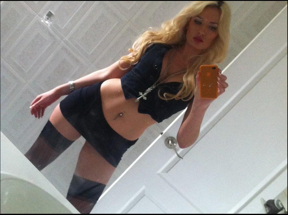 Slutty blonde cam girl Ashley in black stockings