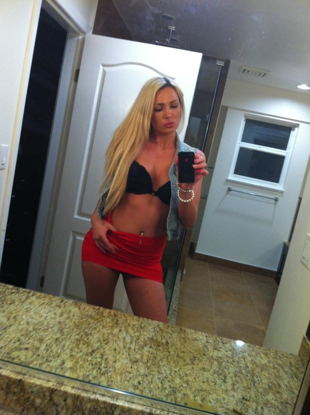 Hot sexy blonde Ashley in short red skirt